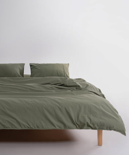 Фактура 100% бавовни stonewash у кольорі Capulet Olive, м’яка натуральна тканина